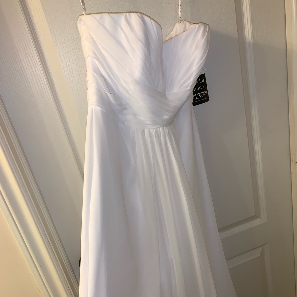 Never before worn white wedding gown